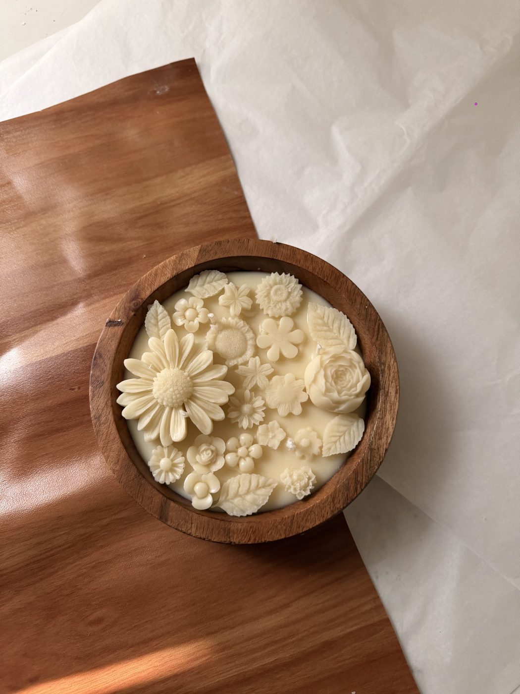 Chandani Round Wooden Candle — soy wax florals in a carved wooden bowl